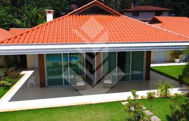 Imagem: A casa possui 3 Dormitórios, 5 Banheiros, 5 Vagas na garagem