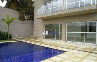 Imagem: A casa em condomínio possui 4 Dormitórios, 5 Banheiros, 5