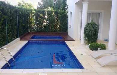 Imagem: A casa em condomínio possui 4 Dormitórios, 5 Banheiros, 4