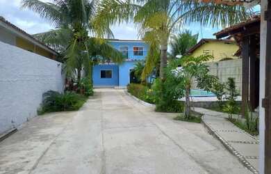 Imagem: A casa possui 3 Dormitórios, 3 Banheiros, 3 Vagas na garagem