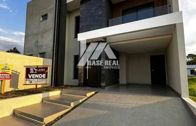 Imagem: A casa possui 3 Dormitórios, 3 Banheiros, 2 Vagas na garagem