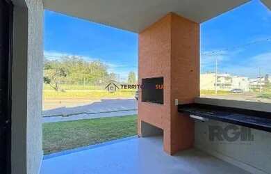 Imagem 14: Casa em Porto Alegre, no bairro Hípica, com 3 dormitório s , e 3 banheiros,...