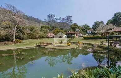 Imagem: A casa possui 5 Dormitórios, 5 Banheiros, 5 Vagas na garagem