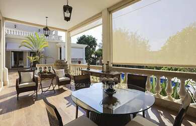 Imagem 13: Casa Clássica em Ponto Alto com Vista Deslumbrante