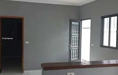 Imagem: A casa possui 2 Dormitórios, 1 Banheiro, 2 Vagas na garagem