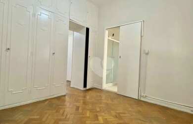 Imagem 9: Sala e quarto em prédio familiar bem administrado em frente ao Aterro...