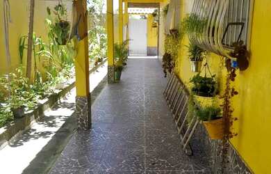 Imagem: A casa à venda possui 5 Dormitórios, 3 Banheiros e 3 Vagas