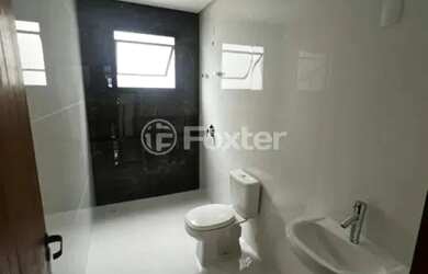 Imagem: A casa possui 3 Dormitórios, 3 Banheiros, 2 Vagas na garagem