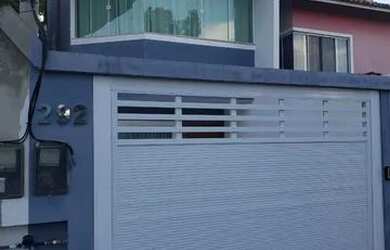 Imagem: A casa possui 3 Dormitórios, 3 Banheiros, 1 Vaga na garagem