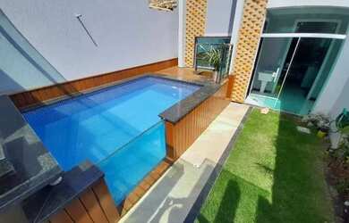 Imagem: A casa possui 3 Dormitórios, 4 Banheiros e 2 Vagas na garagem