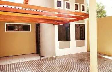 Imagem: A casa possui 3 Dormitórios, 2 Banheiros, 3 Vagas na garagem