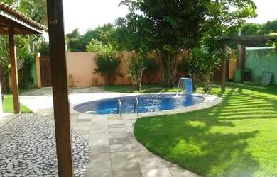 Imagem: A casa possui 3 Dormitórios, 2 Vagas na garagem e está localizado