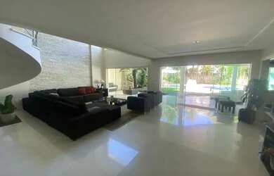 Imagem: A casa em condomínio possui 5 Dormitórios, 5 Banheiros, 4