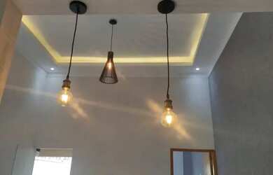 Imagem: A casa possui 3 Dormitórios, 2 Banheiros, 2 Vagas na garagem