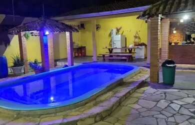 Imagem: A casa possui 4 Dormitórios e 3 Banheiros e está localizado