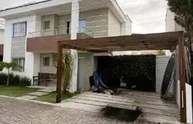 Imagem: A casa em condomínio e possui 4 Dormitórios, 2 Banheiros