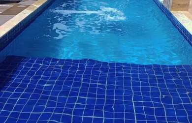 Imagem: A casa em condomínio possui 4 Dormitórios, 3 Banheiros, 2