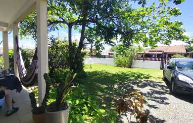 Imagem: A casa possui 3 Dormitórios, 2 Banheiros, 5 Vagas na garagem