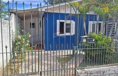 Imagem: A casa possui 4 Dormitórios, 4 Banheiros, 1 Vaga na garagem