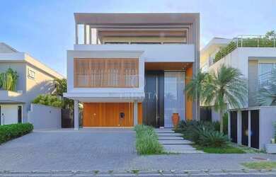 Imagem: A casa em condomínio possui 5 Dormitórios, 5 Banheiros, 4