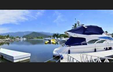 Imagem 2: Casa no Residencial Marina Guarujá no canal de Bertioga