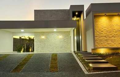 Imagem: A casa possui 3 Dormitórios, 5 Banheiros, 4 Vagas na garagem