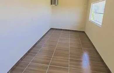 Imagem: A casa possui 2 Dormitórios e 2 Banheiros e está localizado