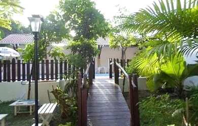 Imagem: A casa possui 4 Dormitórios, 4 Vagas na garagem e está localizado