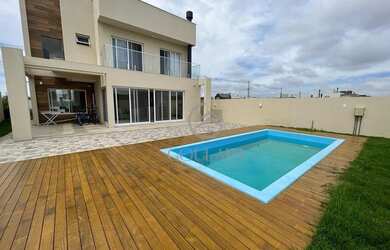 Imagem: A casa em condomínio possui 3 Dormitórios, 3 Banheiros, 4