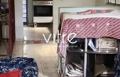 Imagem: A casa possui 4 Dormitórios, 2 Banheiros, 3 Vagas na garagem