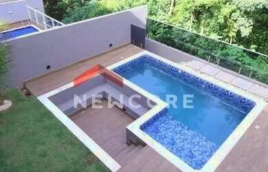 Imagem: A casa em condomínio possui 3 Dormitórios, 4 Banheiros, 3