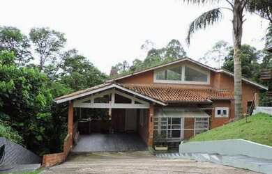 Imagem: A casa possui 4 Dormitórios, 4 Banheiros, 4 Vagas na garagem