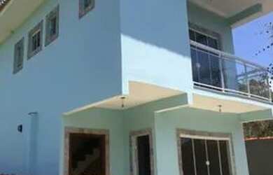 Imagem: A casa possui 2 Dormitórios, 3 Banheiros, 2 Vagas na garagem