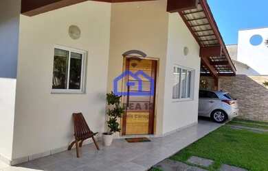 Imagem: A casa possui 4 Dormitórios, 4 Banheiros, 3 Vagas na garagem