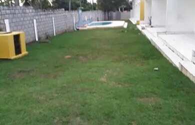 Imagem: A casa possui 3 Dormitórios, 2 Banheiros, 5 Vagas na garagem