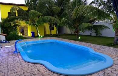 Imagem: A casa em condomínio possui 5 Dormitórios, 3 Banheiros, 3