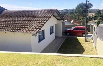 Imagem: A casa possui 2 Dormitórios, 1 Banheiro, 1 Vaga na garagem