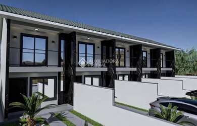 Imagem: A casa possui 2 Dormitórios, 1 Banheiro, 1 Vaga na garagem