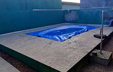 Imagem: A casa possui 3 Dormitórios, 1 Banheiro, 1 Vaga na garagem