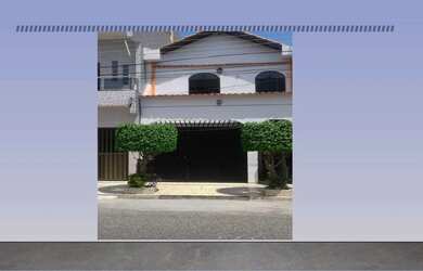 Imagem: A casa possui 2 Dormitórios, Acomodam 3 pessoas e está localizado