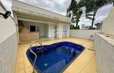 Imagem: A casa em condomínio possui 3 Dormitórios, 5 Banheiros, 4