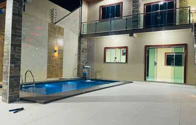 Imagem: A casa possui 5 Dormitórios, 4 Banheiros, 2 Vagas na garagem