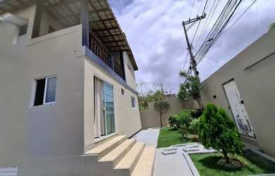 Imagem: A casa possui 4 Dormitórios, 4 Banheiros, 5 Vagas na garagem