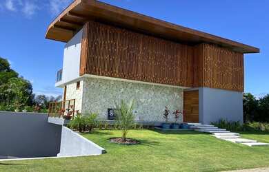 Imagem: A casa possui 5 Dormitórios, 5 Banheiros, 5 Vagas na garagem