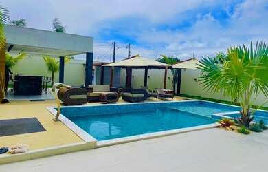 Imagem: A casa em condomínio possui 5 Dormitórios, 4 Banheiros, 4