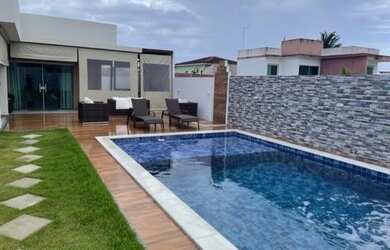 Imagem: A casa possui 3 Dormitórios, 3 Vagas na garagem e está localizado