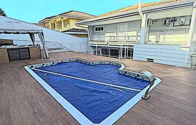 Imagem: A casa em condomínio possui 4 Dormitórios, 5 Banheiros, 5