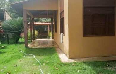 Imagem: A casa possui 3 Dormitórios, 3 Banheiros, 3 Vagas na garagem