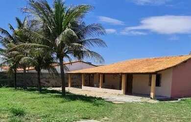 Imagem: A casa possui 3 Dormitórios, 5 Vagas na garagem e está localizado