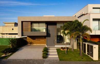 Imagem: A casa em condomínio possui 5 Dormitórios, 5 Banheiros, 4